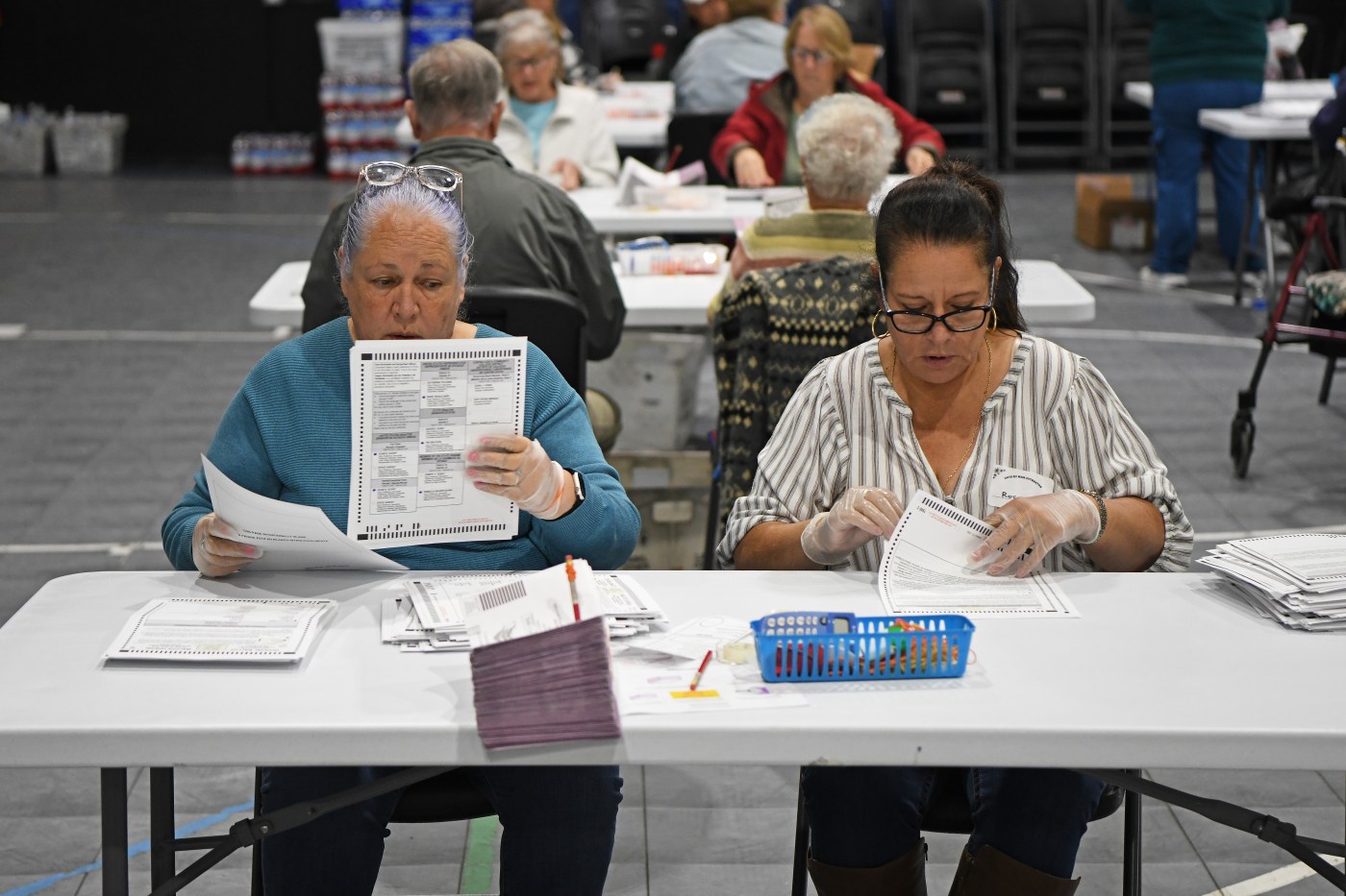 Election officials are expecting a flood of last-minute ballots. How many will be tallied Election Day?