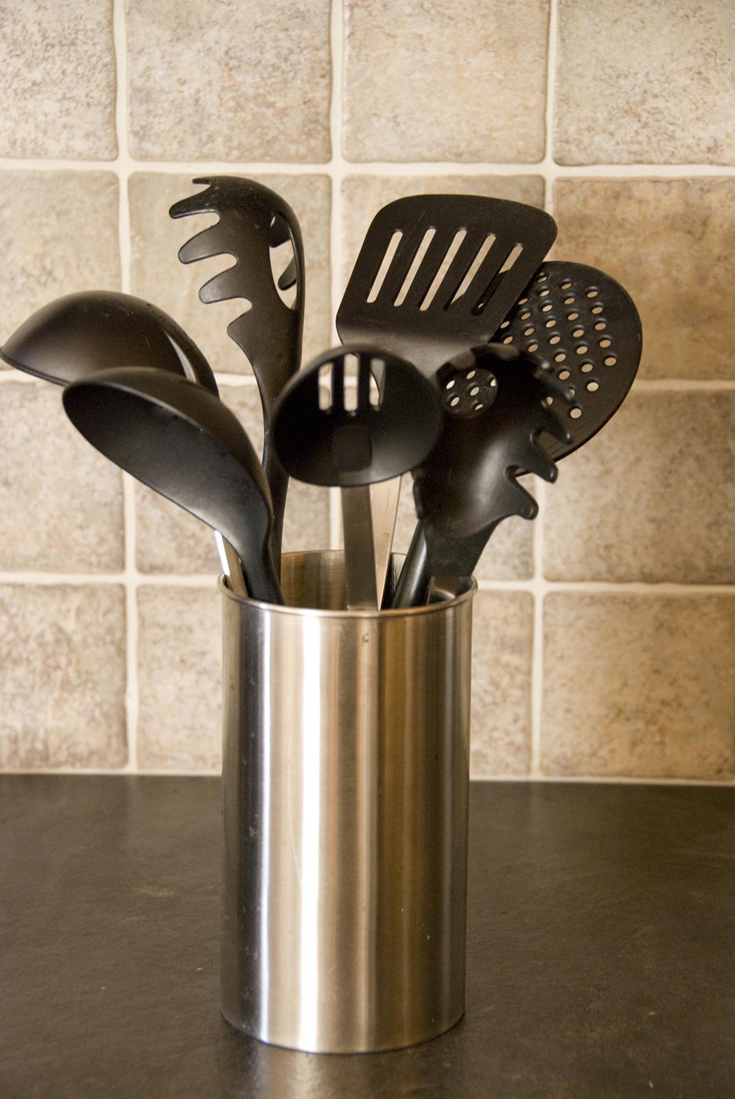 Your black plastic kitchen utensils aren’t so toxic after all. But you should still toss them, group says