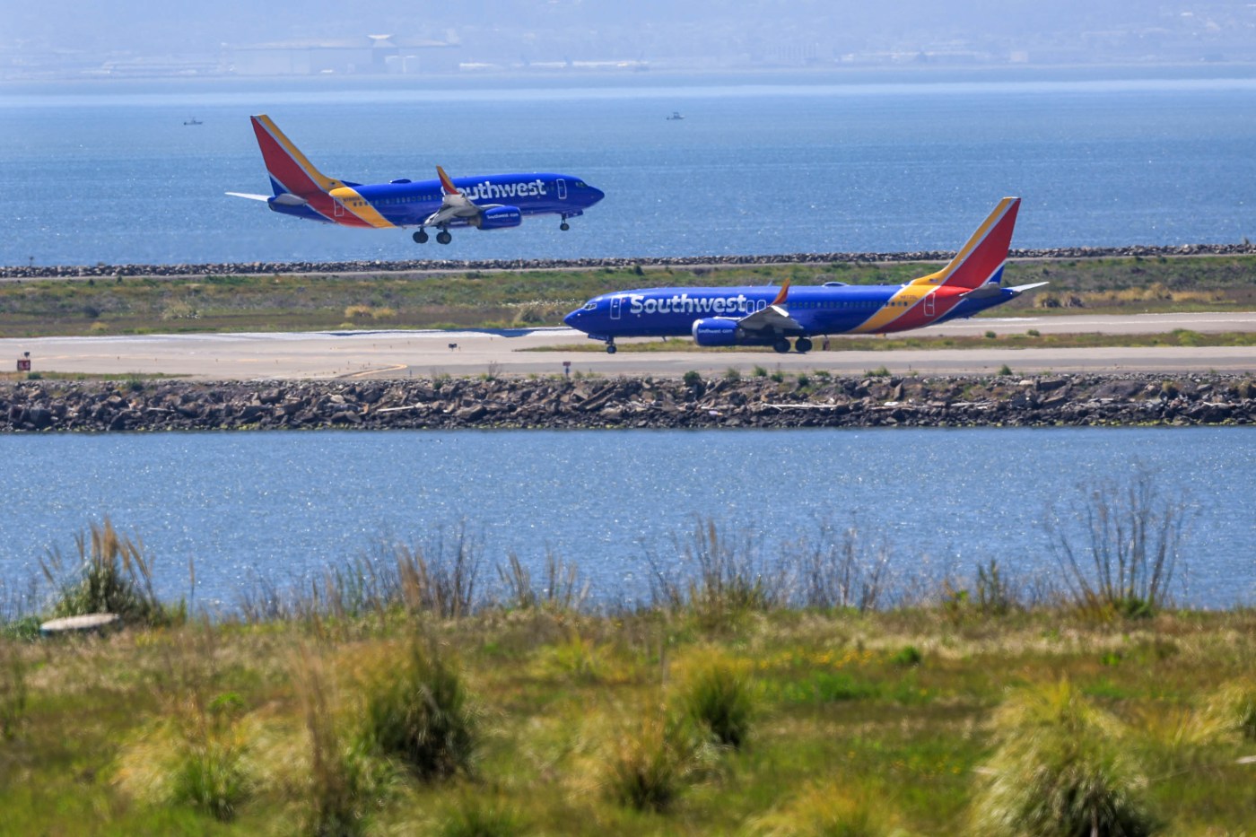 A Southwest jet and a small plane wound up on the same California runway after being cleared to land
