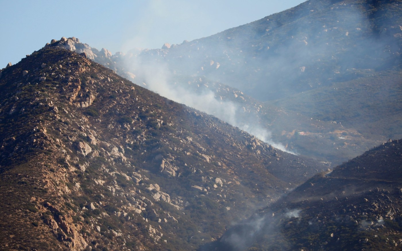 Fierce Santa Ana winds topple big rig trucks in Southern California and push the region toward drought