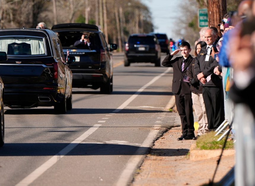 Jimmy Carter’s funeral begins by tracing 100 years from rural Georgia to the world stage