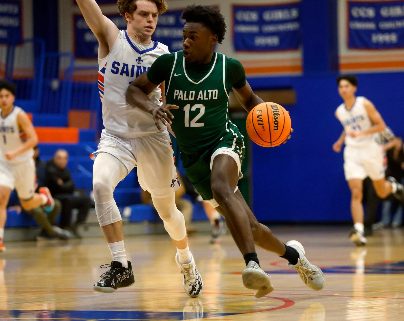 Prep roundup: Palo Alto keeps rolling in boys basketball, Mills girls handle Carlmont