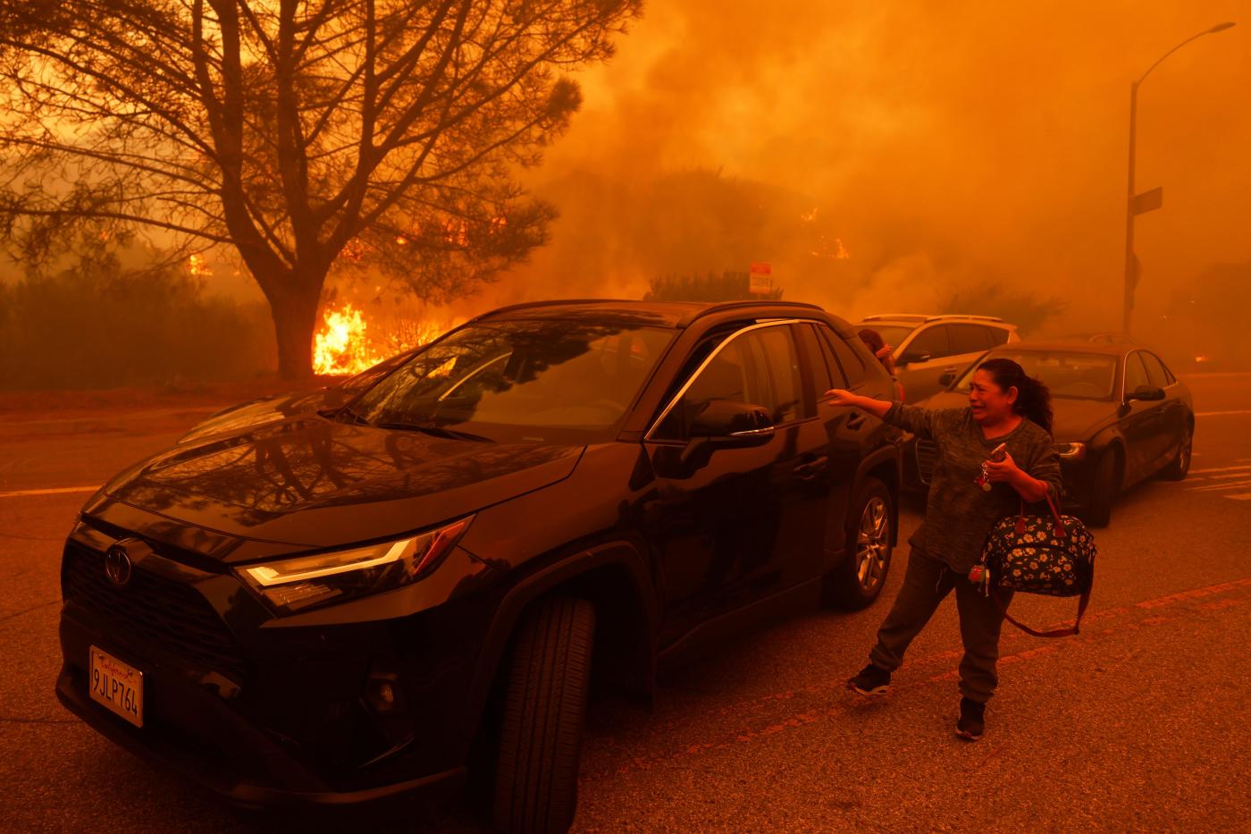 Pacific Palisades evacuation order came after homes were already burning, AP finds