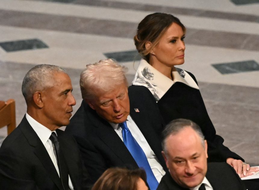 What’s that picture on Melania Trump’s collar at Jimmy Carter funeral?