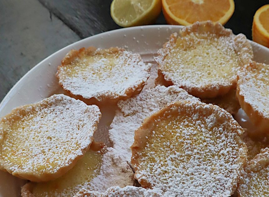 Citrus tartlets combine tangy lemon and orange bites in a buttery pastry