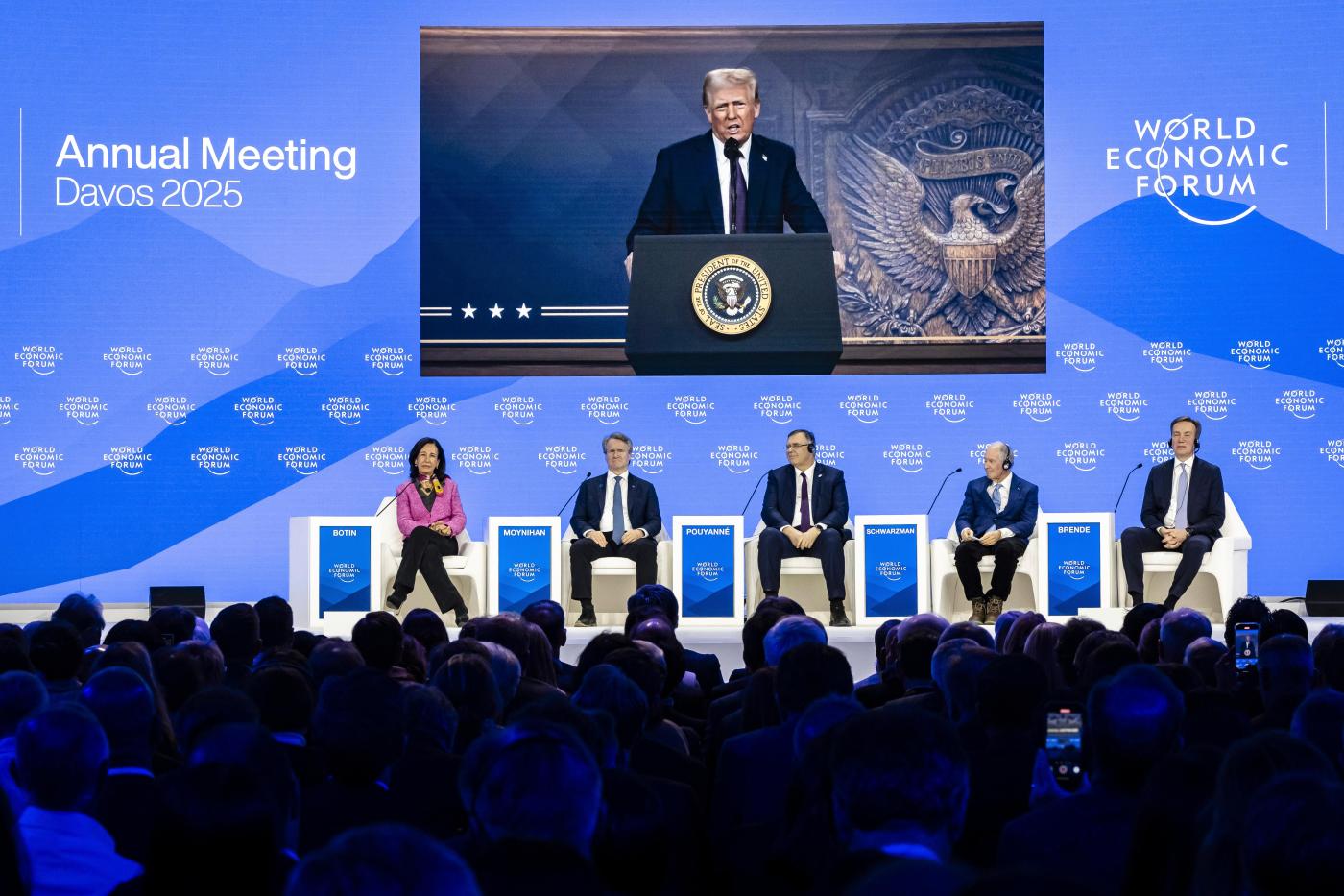 Trump tells Davos elite to invest in US or face tariffs