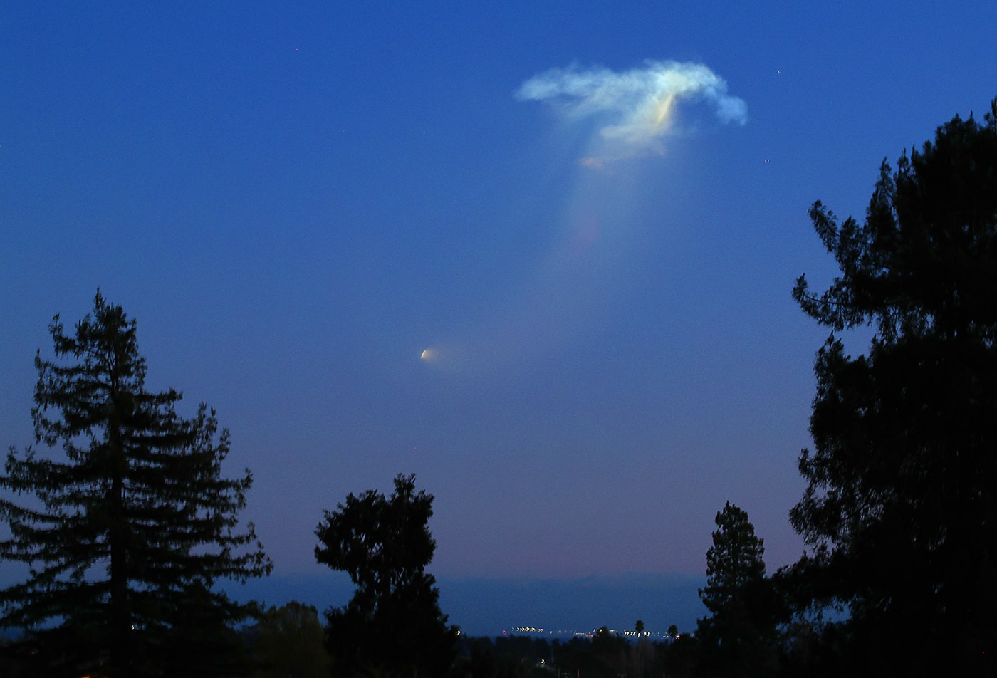 SpaceX Falcon 9 rocket launch from Vandenberg Space Force Base visible in Santa Cruz