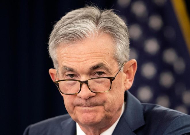 Federal Reserve leaves key rate unchanged, flags a risk of higher prices and unemployment