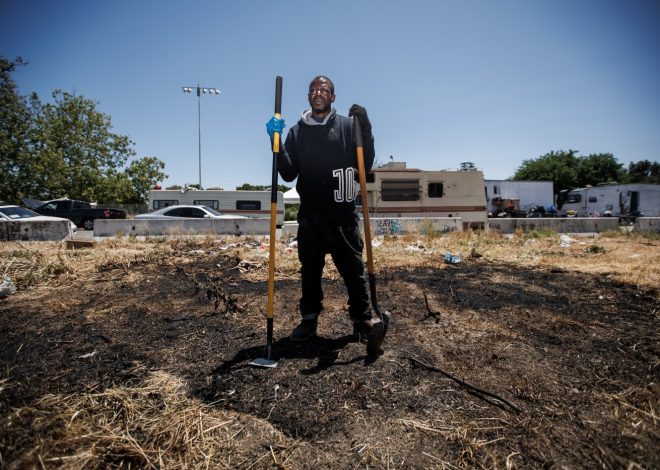 As brush fire races toward San Jose homeless encampment, residents dig a fire line
